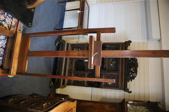 A late Victorian oak artists studio easel, W.2ft H.6ft 8in.